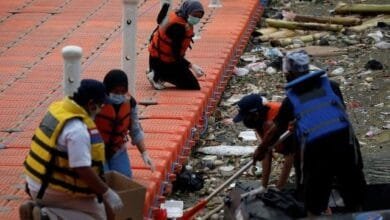 B2ap3 Large In Indonesia Coronavirus Floods Cisadane River With Extra Hazard Medical Waste.jpg